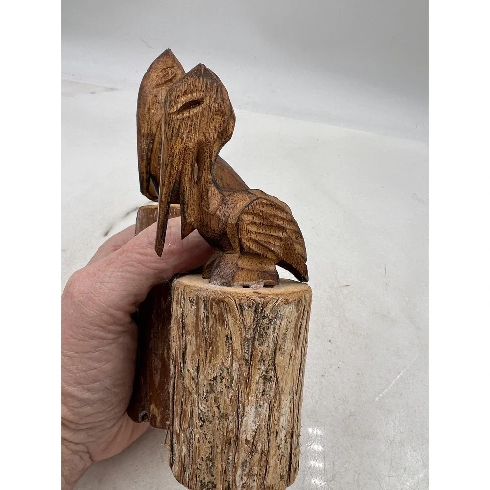 Hand Carved Wood Pelican Pair Figurines on Log Bases Rustic Coastal Folk Art